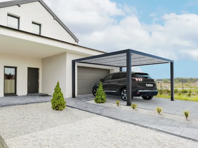 Carport moderne comme abri de voiture, aluminium, en prolongement face avant du garage