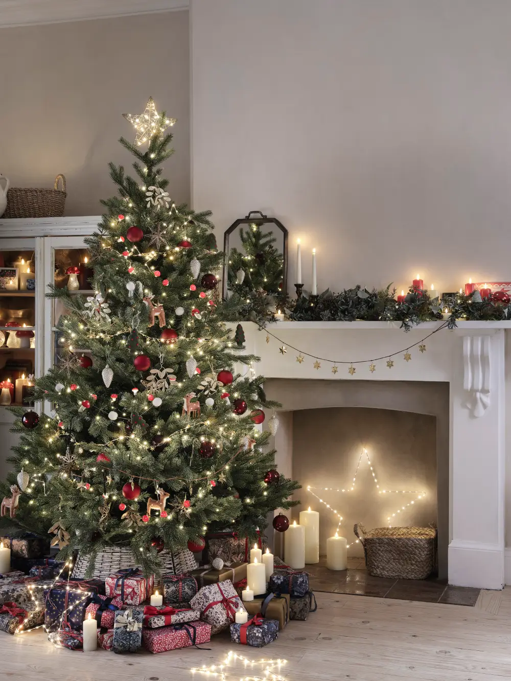 Guirlande, étoile et bougies lumineuse pour créer l'ambiance de Noël